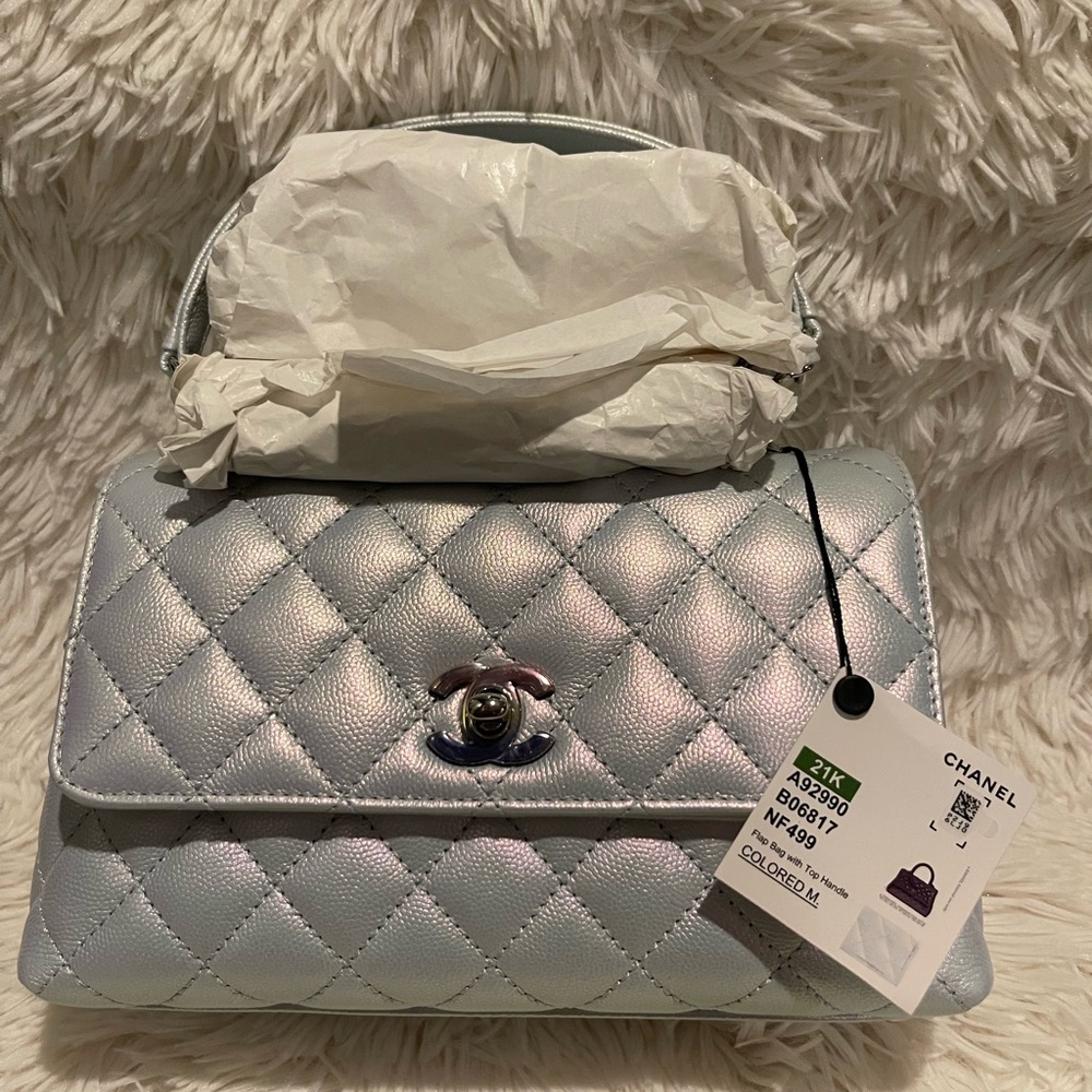 Brand New In Box Small Blue iridescent Coco